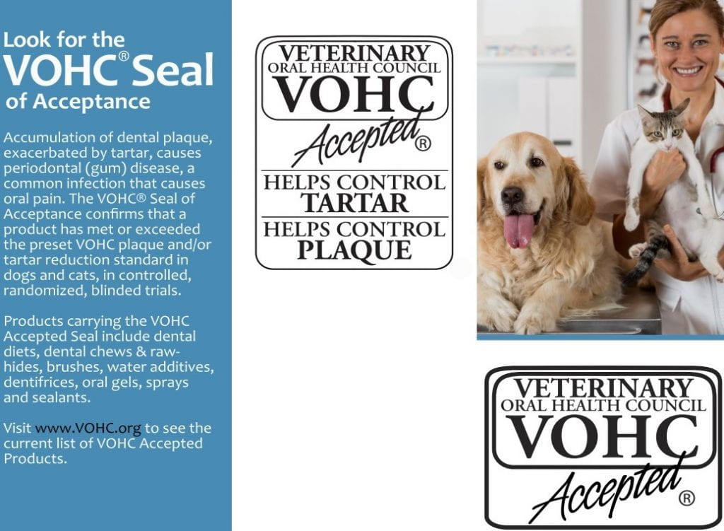 An infographic that says "Look for the VOHC Seal of Acceptance. Accumulation of dental plaque, exacerbated by tartar, causes periodontal (gum) disease, a common infection that causes oral pain. The VOHC Seal of Acceptance confirms that a product has met or exceeded the preset VOHC plaque and/or tartar reduction standard in dogs and cats, in controlled, randomized, blinded trials. Products carrying the VOHC Accepted Seal include the dental diets, dental shews & raw-hides, brushes, water additives, dentifrices, oral gels, sprays and sealants. Visit www.VOHC.org to see the current list of VOHC Accepted Products. " with a photo of a veterinarian holding a cat, with a dog beside her. 